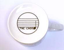Load image into Gallery viewer, Music gift ideal for classical music fans. Elegant bone china mug with a section of Mendelssohn's Violin Concerto printed on in black. This fabulous mug is perfect for any violin player or music lover. A combination of a full capacity of 310ml and a subtle lip and classic handle design makes this mug both comfortable and stylish. Microwave and dishwasher safe. Height 85mm; Diameter 77mm. The Chord Logo on base. thechord.co.uk
