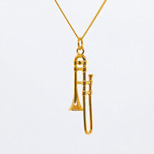 Load image into Gallery viewer, Exquisite Trombone pendant made from fine 18 carat gold plating over high quality 0.925 sterling silver. The Trombone&#39;s intricate design includes details such as the mouthpiece, valve casings, pistons, third valve slide, tuning slide and bell. 