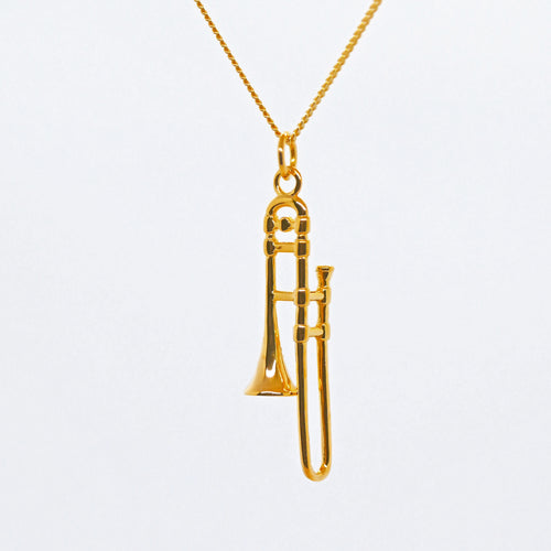 Exquisite Trombone pendant made from fine 18 carat gold plating over high quality 0.925 sterling silver. The Trombone's intricate design includes details such as the mouthpiece, valve casings, pistons, third valve slide, tuning slide and bell. 