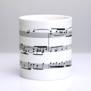 Elegant bone china mug with section of Bach's Fugue in A Minor for Organ printed on 