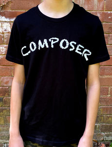 Black T-shirt with white handchalked effect writing of "Composer" in white. Shown on model.