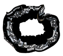 Load image into Gallery viewer, Musical hair tie scrunchie. White music score on black material.  Hand-made, large size (approx 15cm diameter)