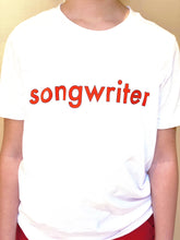Load image into Gallery viewer, White T-shirt with &quot;songwriter&quot; in red text outlined in black. Shown on model.